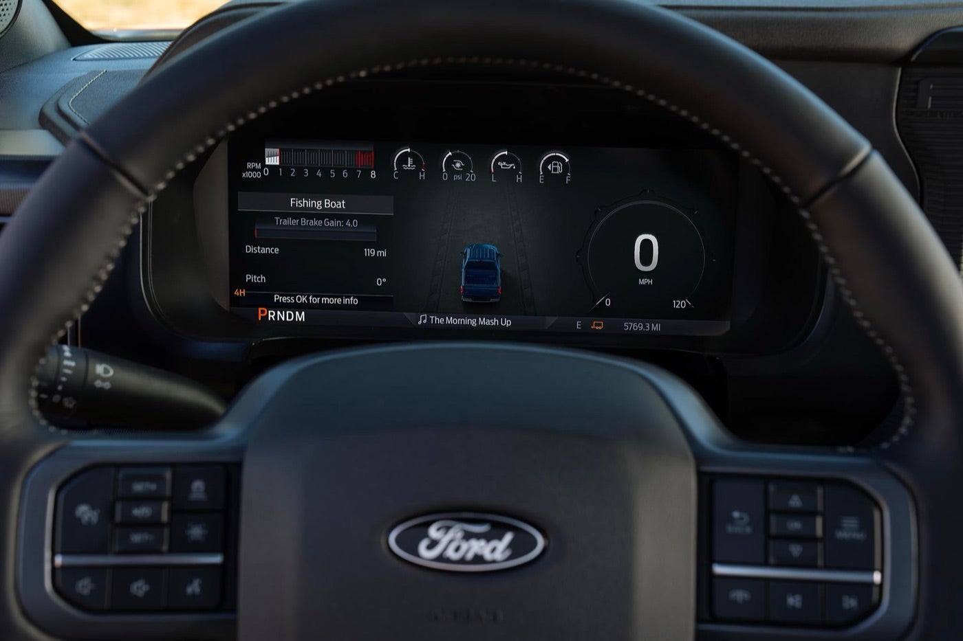 Close up of a Ford F-150 digital instrument cluster display, where a check engine light would show for Bowie, TX drivers
