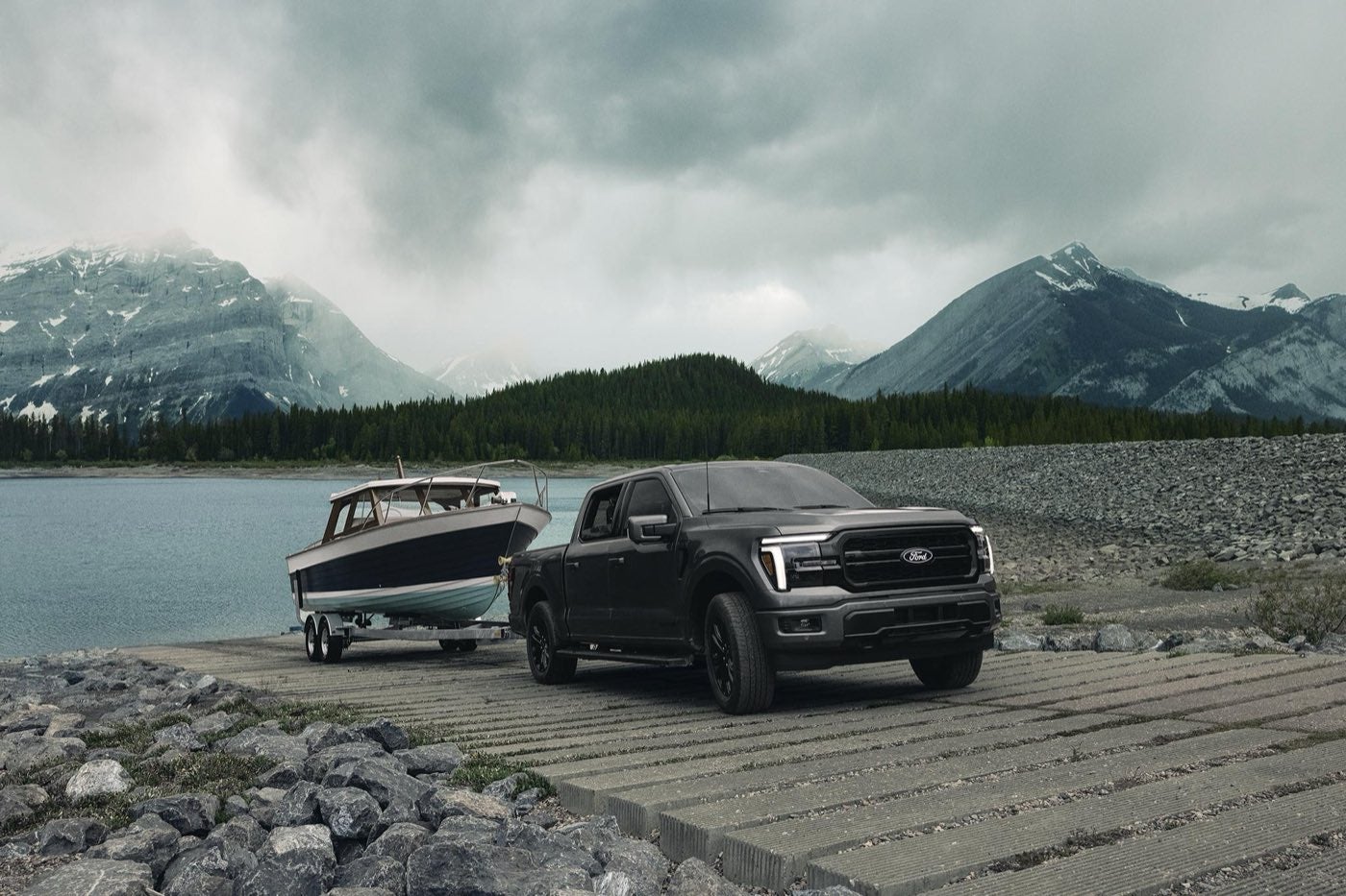 Ford F-150 Lariat with the FX4 Off-Road Package pulling a boat out of the water at a boat launch near Bowie, TX